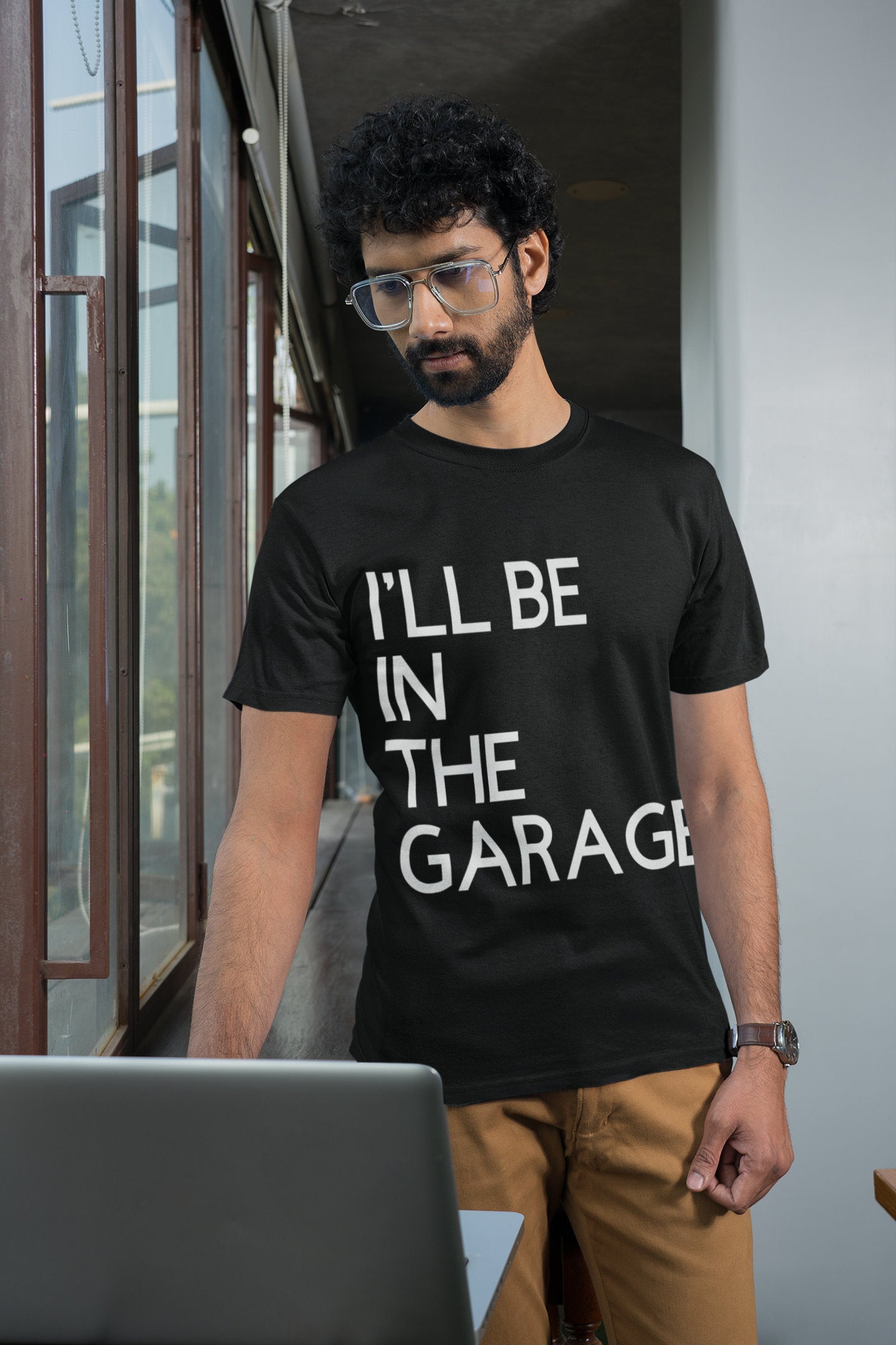 black version of the I'll Be In The Garage tshirt